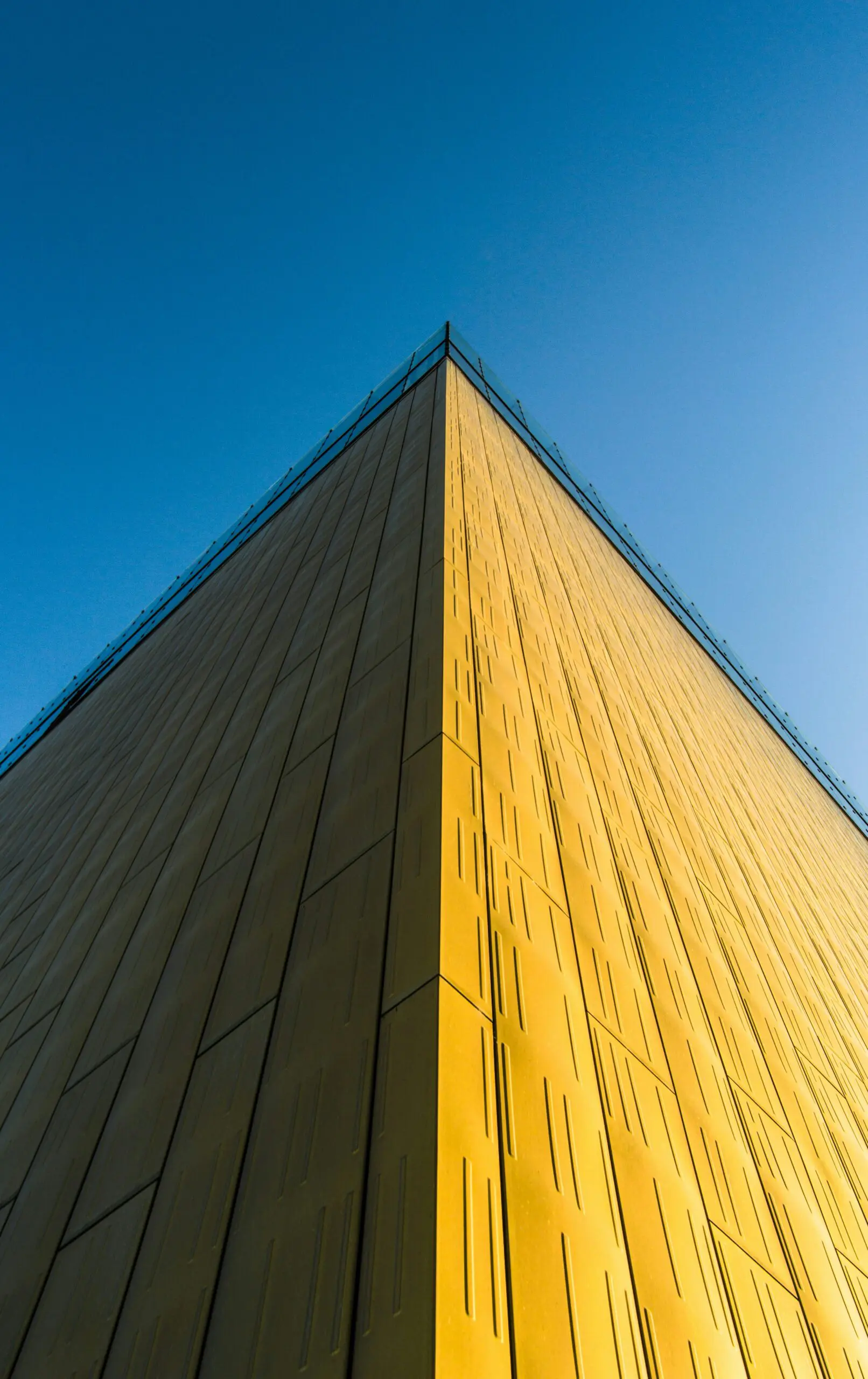 yellow building with blue sky